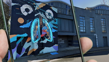 Caption: QR codes are scanned with a mobile phone and digital art installations of body tissue cells and organs, including eyes and lungs, will appear along the route.