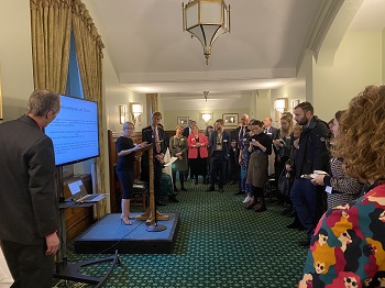 Caption:Dr Adele Irving and Dr Jamie Harding present their research findings at the launch of the report, Tackling Trauma, Ending Homelessness.