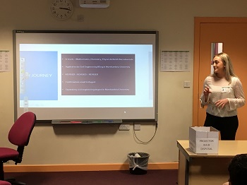 Caption:Cerys pictured giving a presentation about studying civil engineering to school pupils.