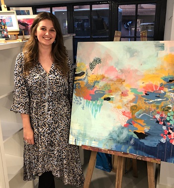 Caption:Northumbria alumna Jessica Slack with her artwork Finding Life's Joy