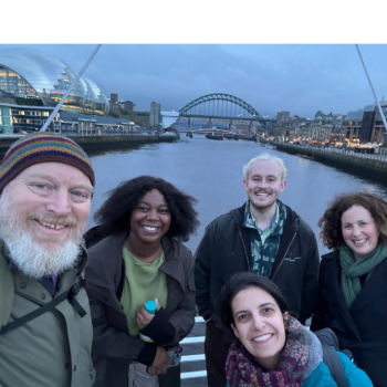Caption: Matt Baillie Smith, Maxine Mpofu and Bianca Fadel from Northumbria University are pictured with Fiachra Brennan and Dervla King from Comhlámh during a conference planning session in Newcastle.