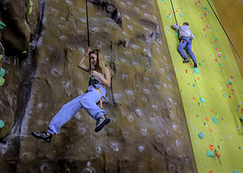 HAF Plus at Northumbria University - participants on climbing wall 