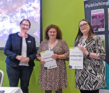 Caption: General Secretary of the Microbiology Society, Professor Karen Robinson, presents Dr Helen Hooper and Dr Amanda Jones from Northumbria University with the 2024 Microbiology Society Outreach Prize. Photo: Courtesy of the Microbiology Society 