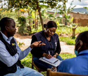 Caption: Volunteering builds inroads and supports communities. In this photo, UN Volunteers interview community members to assess basic health services in the rural areas of Rwanda.  Copyright UNV, 2023