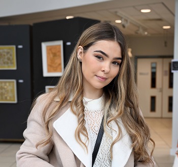 caption:Northumbria University fashion graduate Abbie Inwood