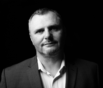 caption:Professor Glyn Howatson