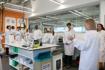 caption:Dr Alana James (far right) and Dr Kelly Sheridan (second from right) demonstrating some of the work going on within the FibER Hub.