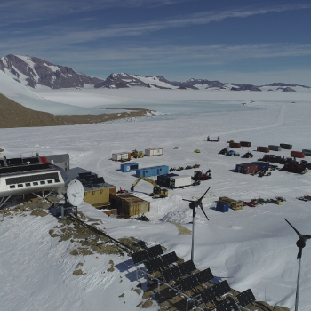 Caption: The Princess Elisabeth Antarctic Research Station is conveniently situated next to coastal margin mountains in East Antarctica. Credit: Dr Kate Winter, drone footage