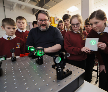Caption: Professor Robert Wicks from Northumbria University demonstrates an interferometer – an instrument which uses two beams of light to make precise measurements – for pupils.