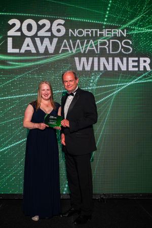 Caption: Sara Lambert being presented with her award by Andrew Entwistle of GFW.