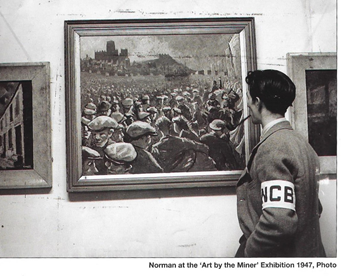 caption:Norman Cornish photographed at the Art by the Miner exhibition. The painting Colliery Row can be seen in the left of the shot.