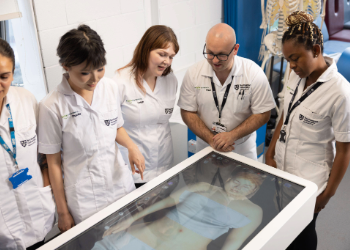 caption:Simulation training gives students hands-on access to realistic experiences before real-world placements in the NHS and private organisations.