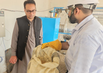 caption:Dr Jibran Khaliq pictured during a demontration event in Saleh Pat in Pakistan.