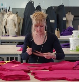 Woman making clinical gowns