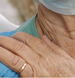 Woman holding shoulder