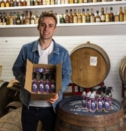 Fraser Mair holding a box of Leithal Santiser