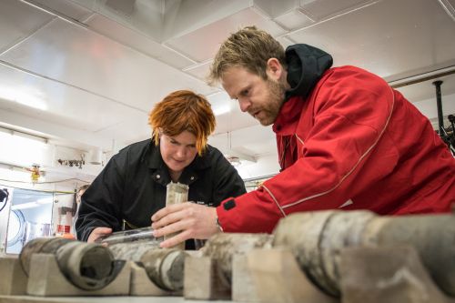 Caption:Johann Klages examining the sediment core 