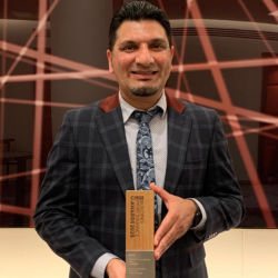 Dr Muhammad Wakil Shahzad holding the Innovation of the Year award at the CIBSE Awards 2025