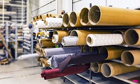 rolls of fabric in a textile factory