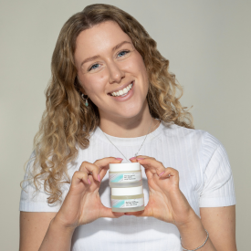 Annabelle Hill holding Sea The Love products