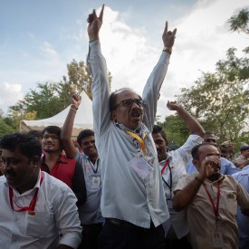 Employees of the Indian Space Research Organisation (ISRO) celebrate after the successful landing of Chandrayaan-3 mission on the moon.