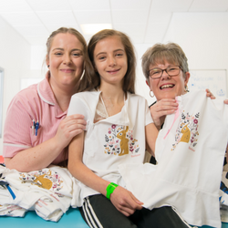 Lisa Ternent (left) and Denise Crawford (right) with patient Sienna Steele, aged 10.