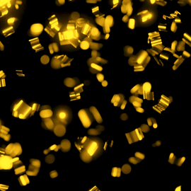 Gold confetti against a black background