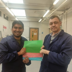 Dr Ulugbek Azimov (right) and Research fellow Iftheker Ahmed (left), holding new biopolymer material samples. 