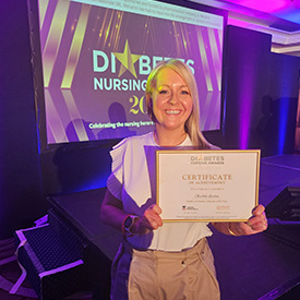 Assistant Professor Charlotte Gordon at the Diabetes Nursing Awards with certificate of achievement