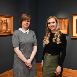 Pictured are Amy Pargeter, Assistant Keeper of Art at Tyne and Wear Archives and Museums, and Northumbria University PhD student Ella Nixon, standing in the Laing Art Gallery with pictures on the wall behind them