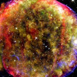 : Composite image of the Tycho Supernova remnant. Shock waves from such explosive events are believed to be the main drivers behind cosmic rays. Credit: MPIA/NASA/Calar Alto Observatory