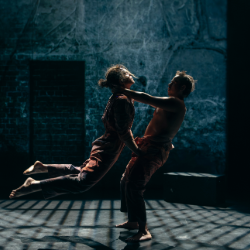 two men pictured dancing