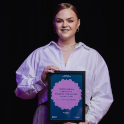 Victoria Flemming pictured holding her Northern Writers' Award