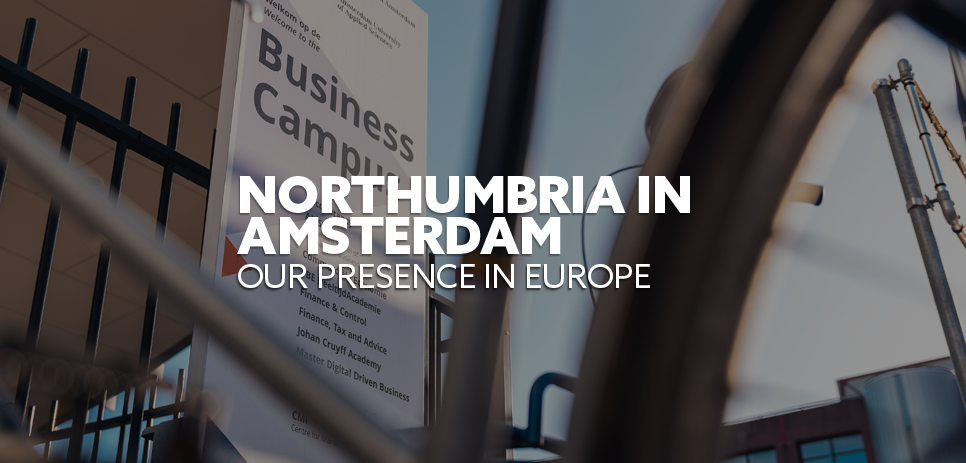Image: close-up of the Business Campus sign at Fraijlemaborg, AUAS. Text: "Northumbria in Amsterdam. Our presence in Europe"