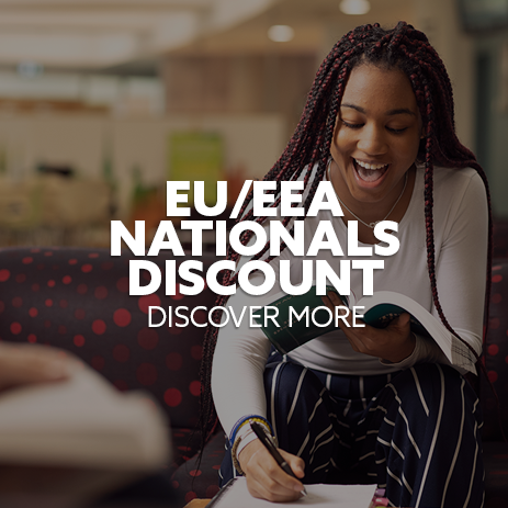 Female student sat, smiling and taking notes. Text: "EU/EEA Nationals Discount"