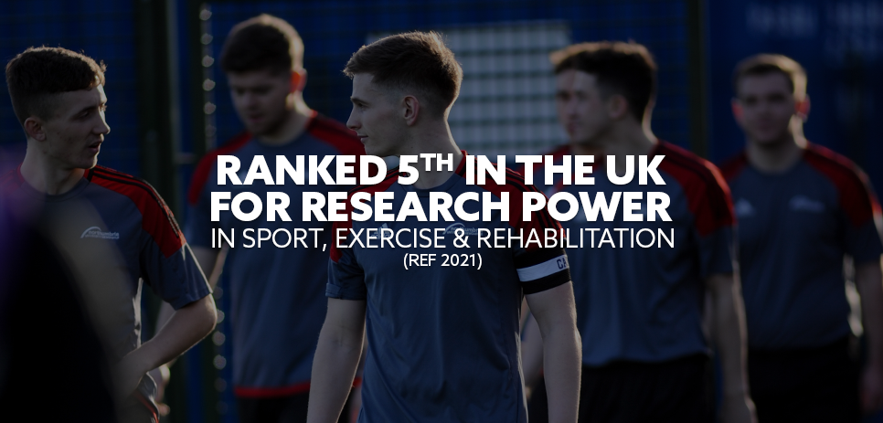Image: Business student writing in a book, smiling. Text: "Ranked 5th in the UK for Research Power in Sport, Exercise and Rehabilitation (REF 2021)"