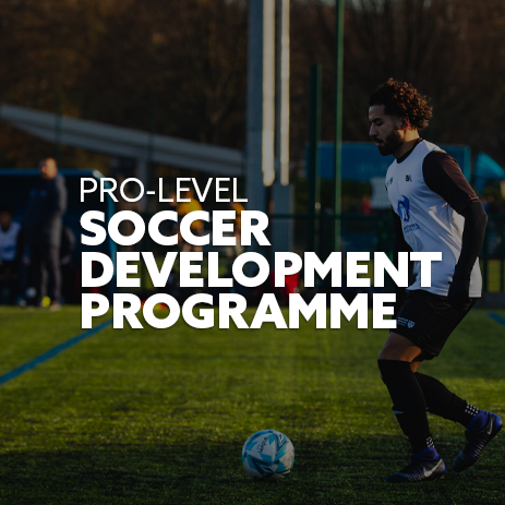 Image: i2i student-athlete running up to take a penalty kick. Text: "Pro-level Soccer Development Programme"