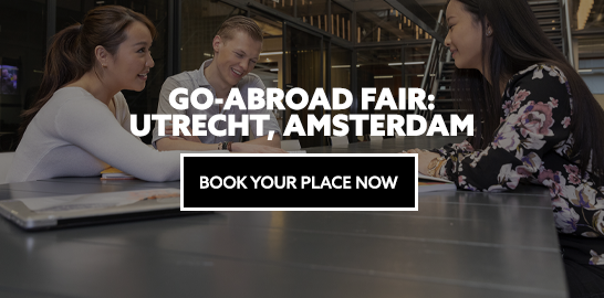 Image: three students gathered around a table. Text: Go-Abroad Fair: Utrecht, Amsterdam. Book your place now.