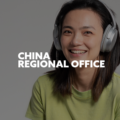 Image: Chinese student wearing headphones, laughing. Text: "China Regional Office"