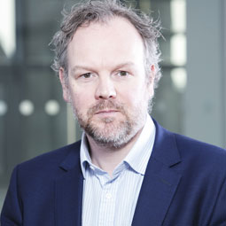 a man wearing a suit and tie