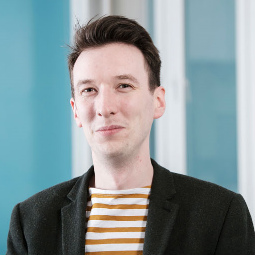 a man wearing a suit and tie