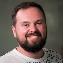 a man smiling for the camera