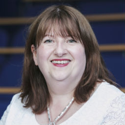 a person smiling for the camera