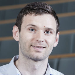 a man smiling for the camera