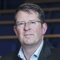 a man wearing a suit and tie