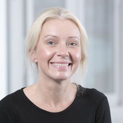 a woman smiling for the camera