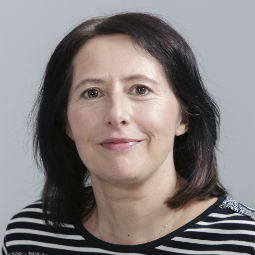 a woman smiling for the camera