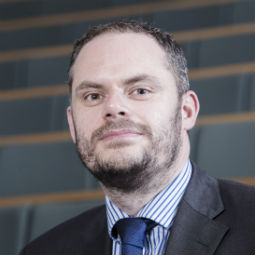 a man wearing a suit and tie