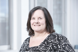 a woman smiling for the camera