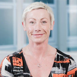 a woman smiling for the camera